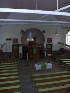 Het interieur van de kerkzaal (foto: Reliwiki).